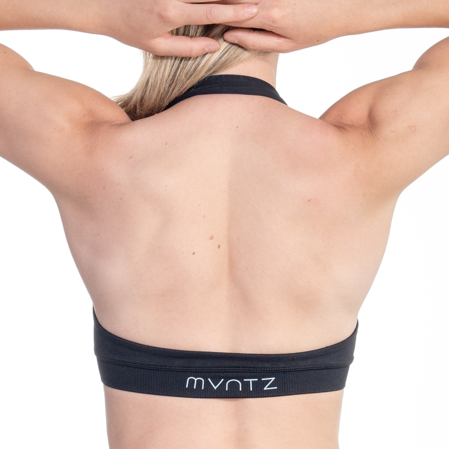 Rückenansicht des schwarzen Sport-BHs – stilvoller Neckholder mit offenem Rücken & perfektem Sitz